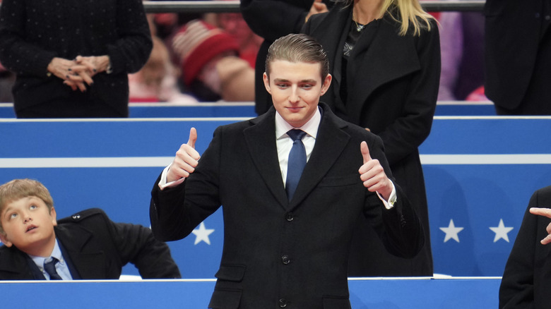 Barron Trumpv wearing a blue tie
