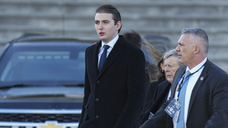 Barron Trump walking