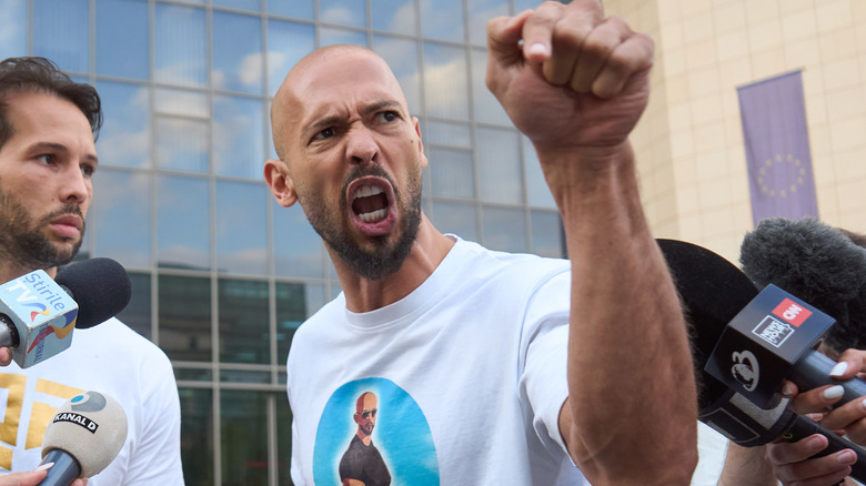 Andrew Tate yelling at photographers in Romania