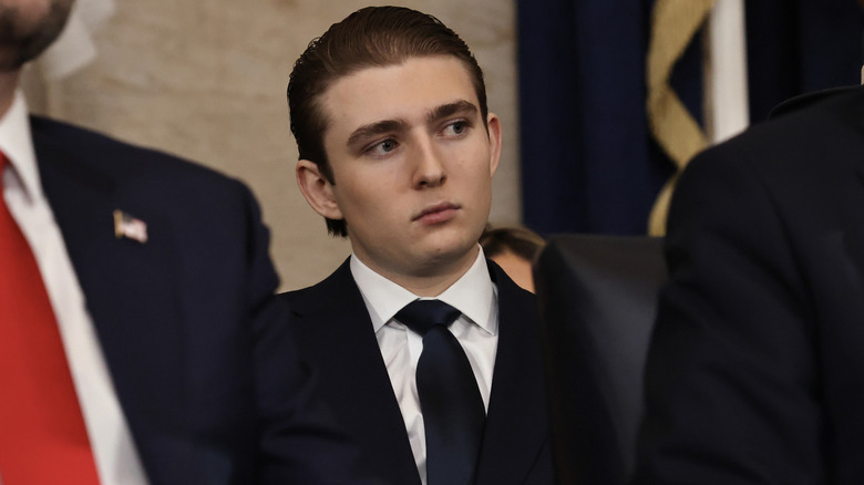 Barron Trump seated behind Donald Trump and JD Vance on Inauguration Day 2025