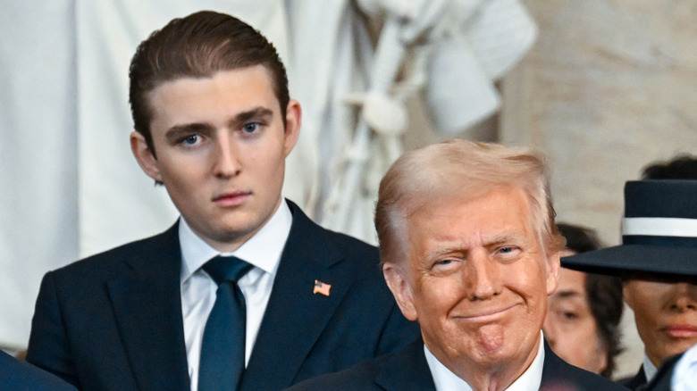 Barron Trump, Donald Trump, listening on during inauguration ceremony