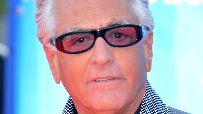 Barry Weiss looks on