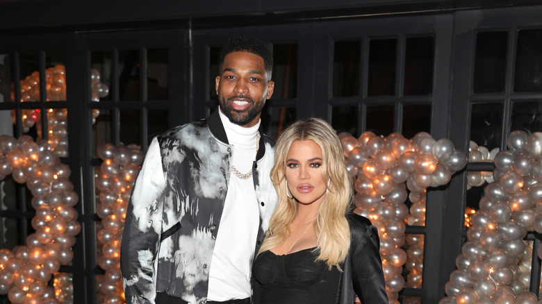 Tristan Thompson, posing with Khloe Kardashian