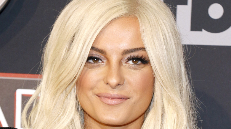 Bebe Rexha smiling on the red carpet