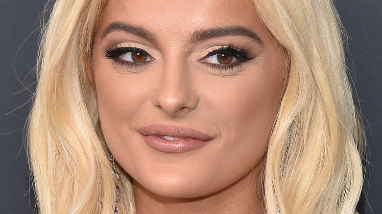 Bebe Rexha smiling at an event