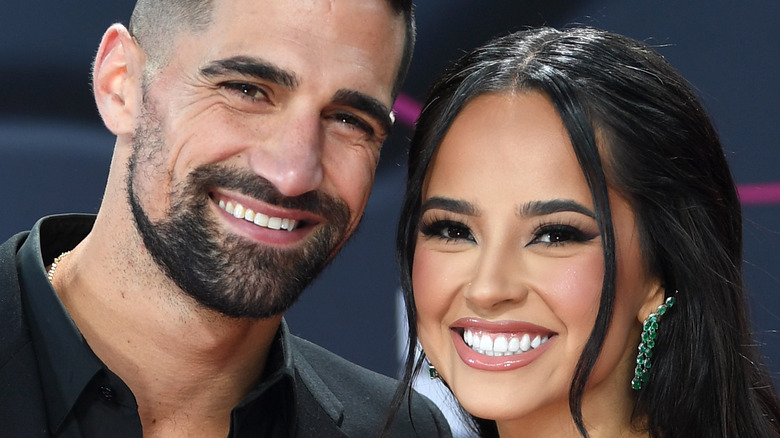 Becky G and Sebastian Lletget smiling