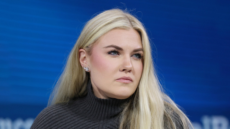 Erika Kirk sits onstage at December 2025 event