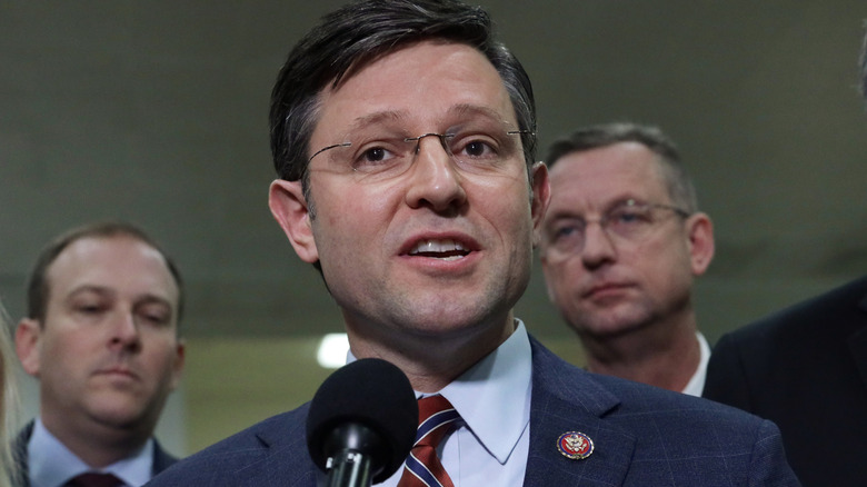 Mike Johnson speaking to the press in 2020.