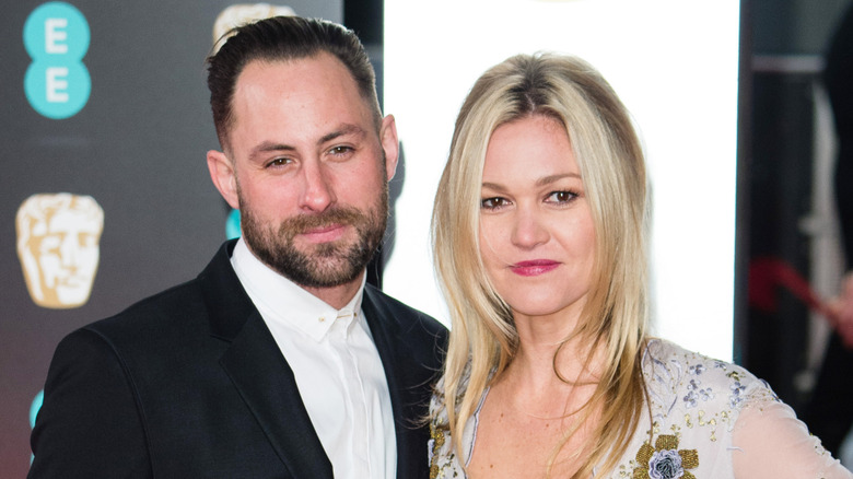 Preston J.Cook and Julia Stiles at the 70th EE British Academy Film Awards
