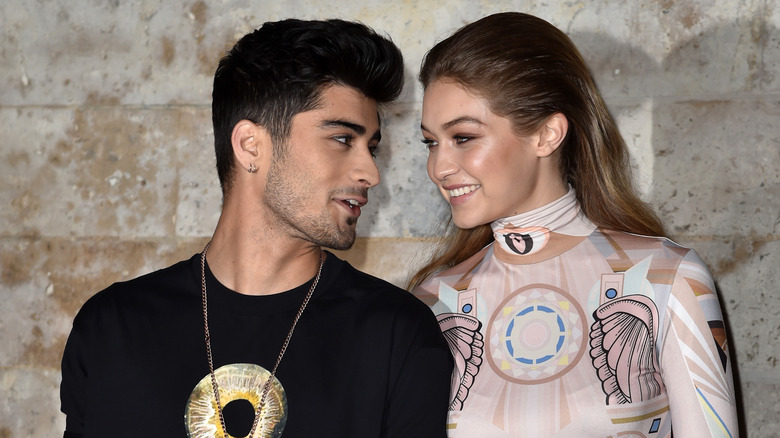 Zayn Malik and Gigi Hadid look at each other lovingly