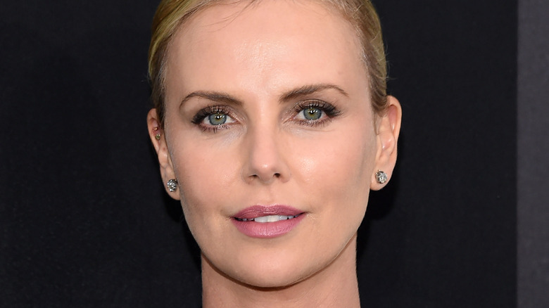 Charlize Theron looking at camera, Atomic Blonde premiere