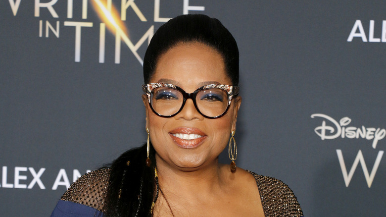 Oprah Winfrey smiling on the red carpet