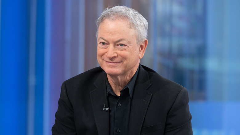 Gary SInise smiling on a Fox talk show.