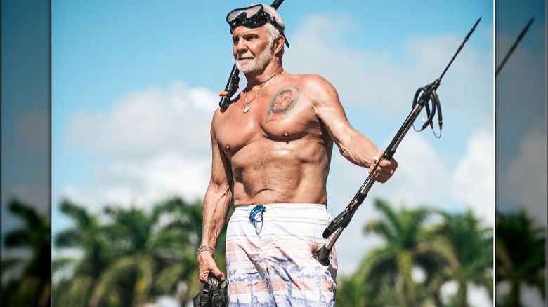 Captain Lee Rosbach shorts and no shirt