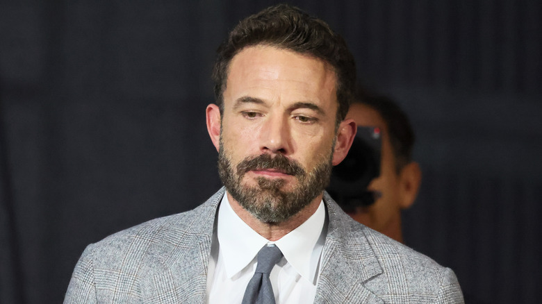 Ben Affleck, smirking