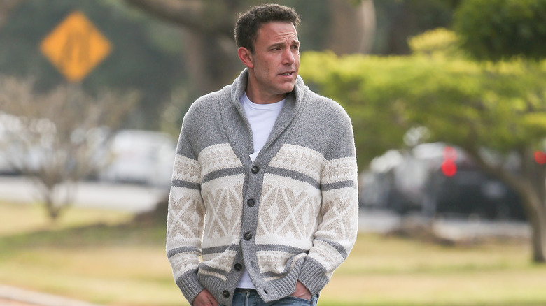 Ben Affleck wearing cardigan walking down the street