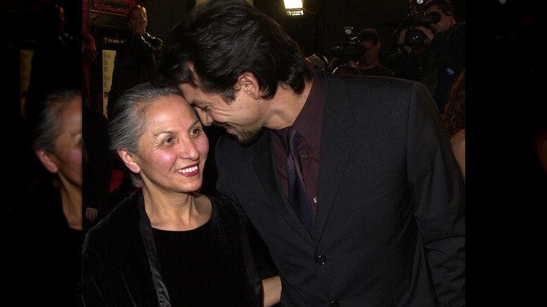 Benjamin Bratt cuddled up to his mother
