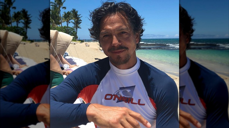 Benjamin Bratt getting ready to surf