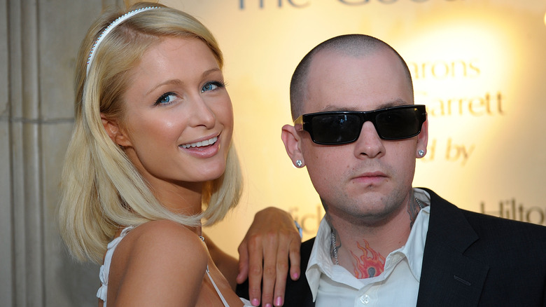 Benji Madden and Paris Hilton pose together