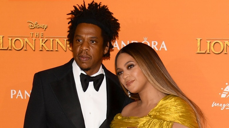 Jay-Z smiling with Beyoncé