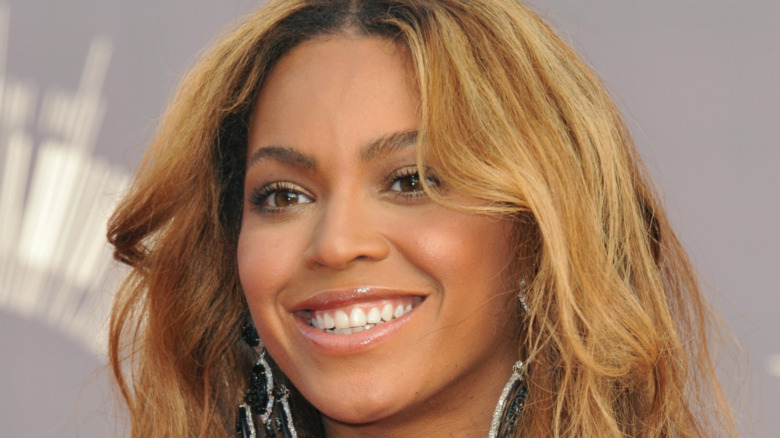 Beyonce smiling at an event