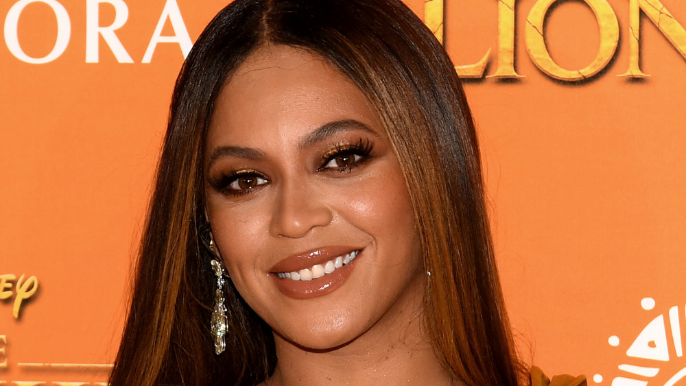 Beyoncé smiling on the red carpet