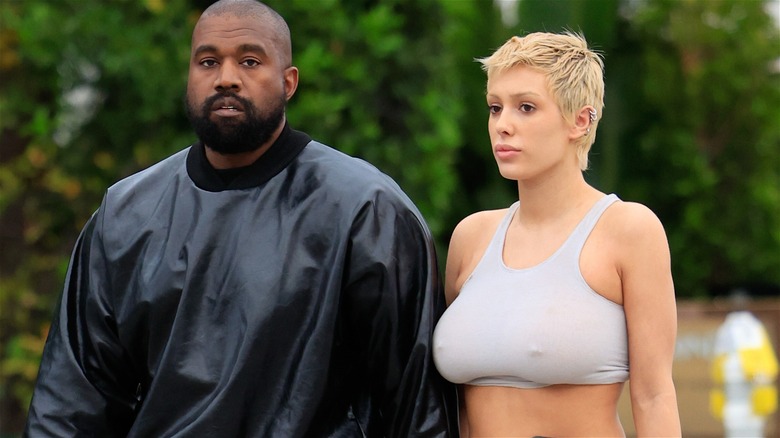 Kanye West and Bianca Censori walking