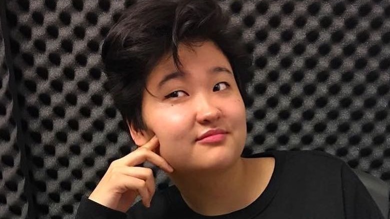 Celeste Yim posing for photo in studio