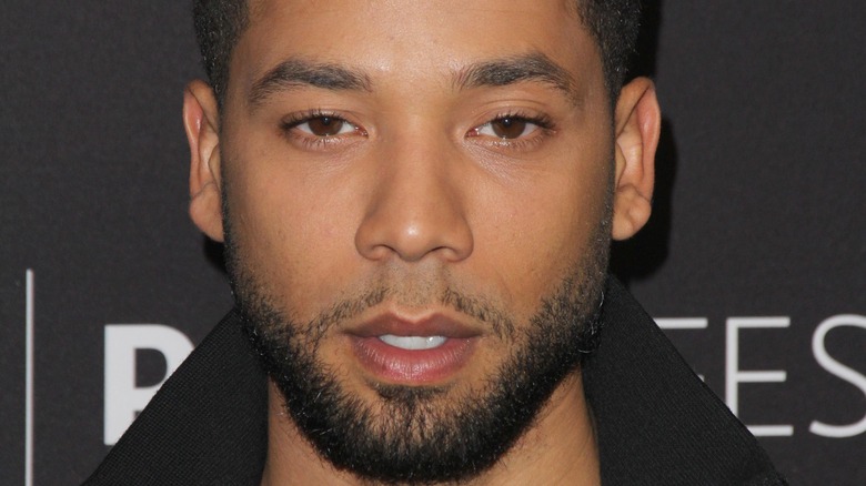 Jussie Smollett grimaces on the red carpet