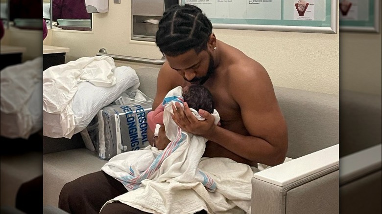 Big Sean holding son Noah