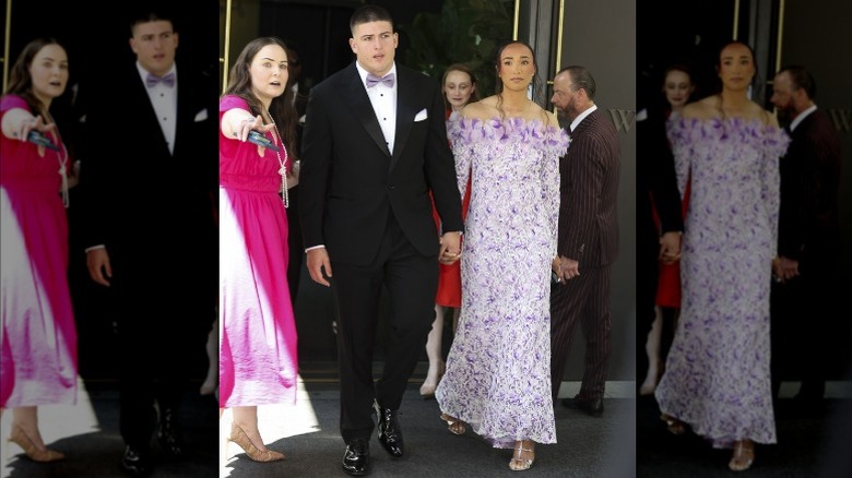 George Karlaftis and Kaia Harris holding hands.