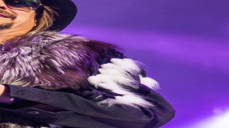 Kid Rock onstage performing