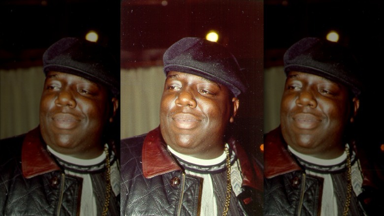 Biggie Smalls smirks