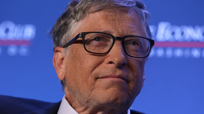 Bill Gates wearing black-rimmed glasses