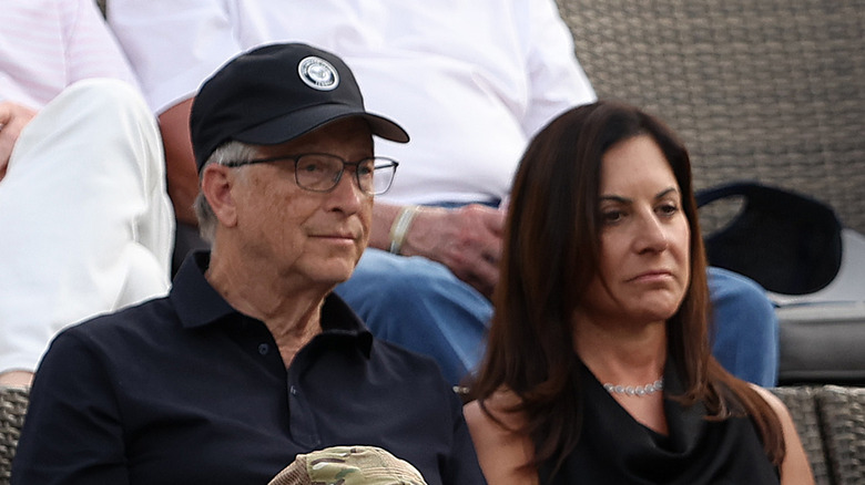 Bill Gates and Paula Hurd at tennis match