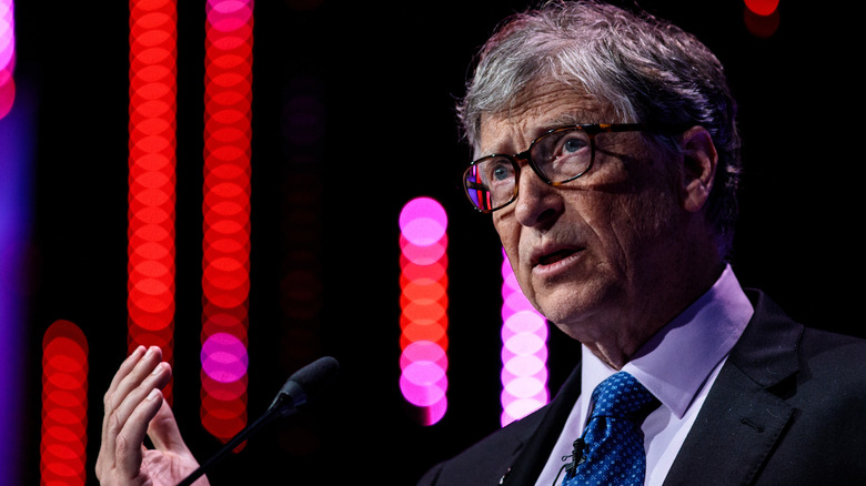 Bill Gates speaking at a summit in 2018