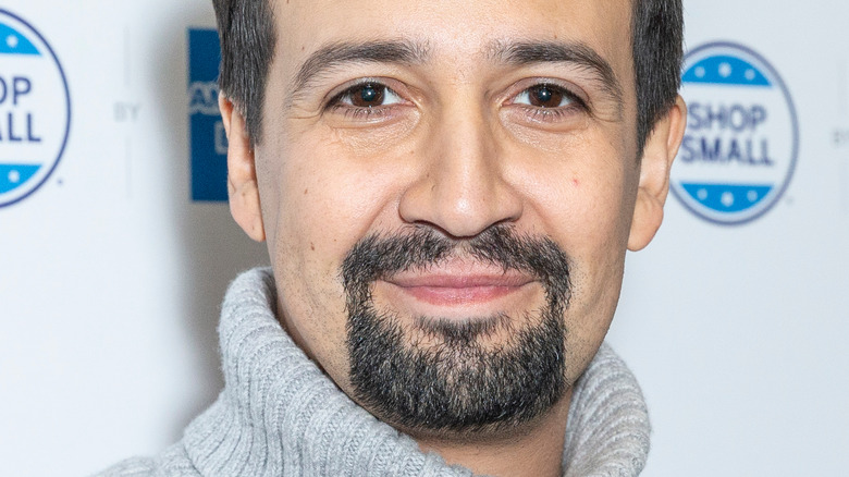 Lin-Manuel Miranda smiling at an event