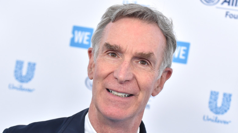 Bill Nye wears a blue bowtie at an event