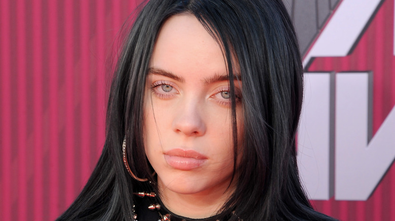 Billie Eilish with a serious expression