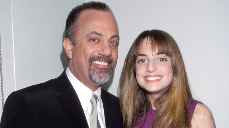 Billy Joel and Alexa Ray Joel pose in 2000