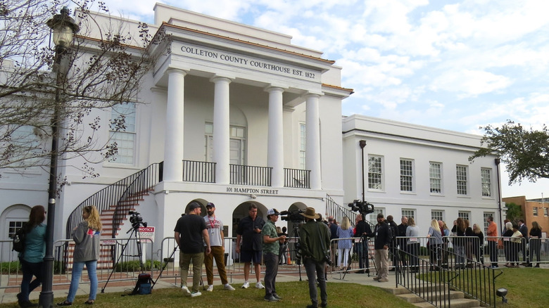 Exterior of the Colleton County Courthouse with many people and cameras standing out front