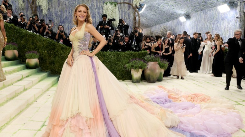 Blake Lively smiling in a ball gown for the 2026 Met Gala