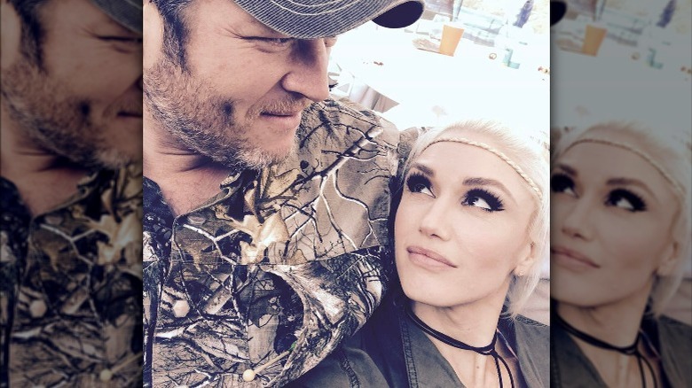 Gwen Stefani gazing up at Blake Shelton