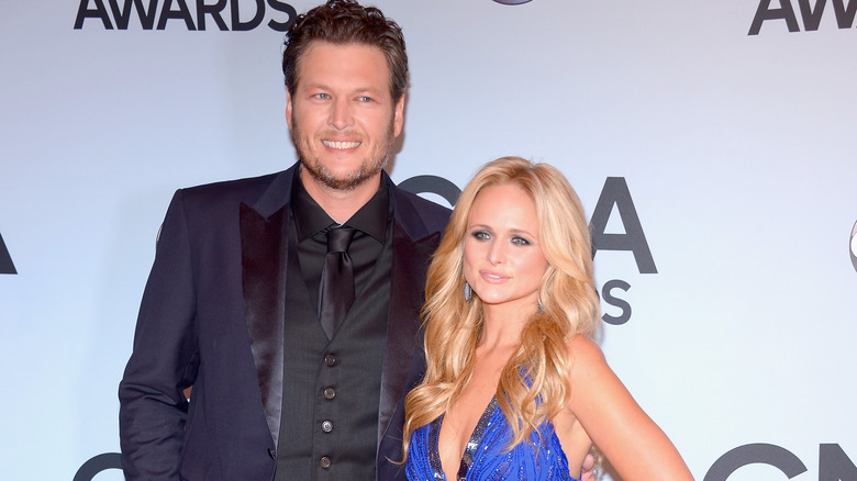 Blake Shelton, Miranda Lambert posing