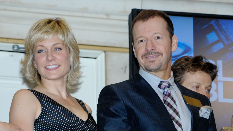 Amy Carlson and Donnie Wahlberg smiling