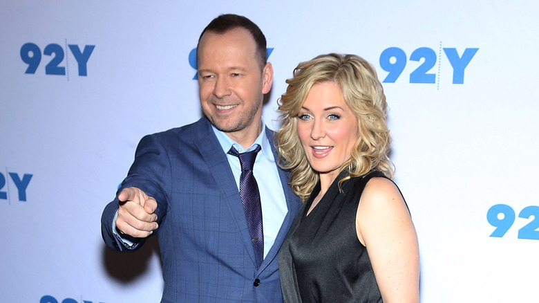 Amy Carlson and Donnie Wahlberg posing