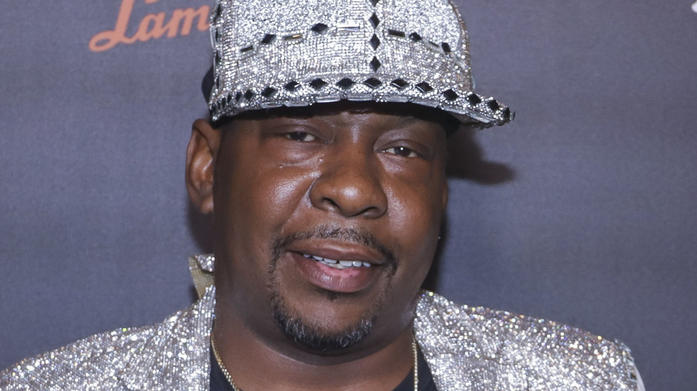 Bobby Brown wearing a silver cap on the red carpet