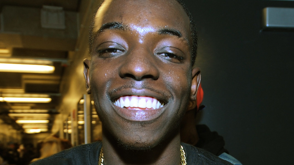 Bobby Shmurda grinning