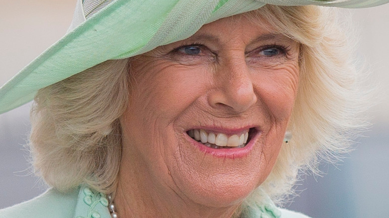 Camilla Parker Bowles wearing green hat