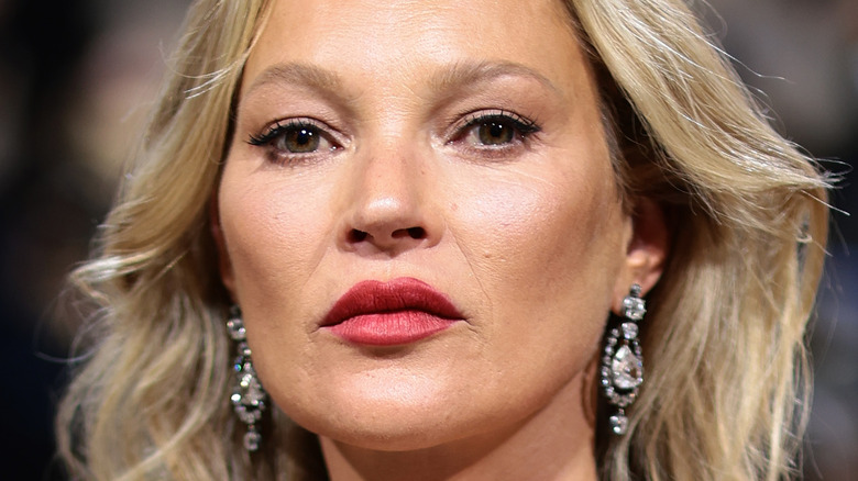 Kate Moss red lip diamond earrings